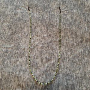 Green and white beaded eyeglass holder approx 27"